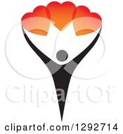 Black Person Holding Up Gradient Red And Orange Love Hearts