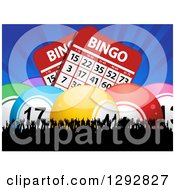 3d Colorful Bingo Balls And Giant Cards With Blue Rays Over A Silhouetted Cheering Crowd