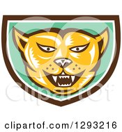 Poster, Art Print Of Retro Woodcut Cougar Puma Mountain Lion Head In A Brown White And Green Shield