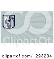 Clipart Of A Retro Working Lineman And Rays Background Or Business Card Design Royalty Free Illustration
