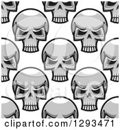 Clipart Of A Seamless Pattern Background Of Grayscale Monster Skulls Royalty Free Vector Illustration