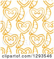 Seamless Pattern Background Of Orange Soft Pretzels And Croissants