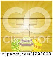 Poster, Art Print Of Wood Panel And Ray Background With An Easter Cross And Striped Easter Eggs