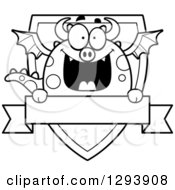 Clipart Of A Badge Or Label Of A Happy Black And White Dragon Over A Shield And Blank Banner Royalty Free Vector Illustration by Cory Thoman