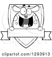 Clipart Of A Badge Or Label Of A Happy Black And White Dog Over A Shield And Blank Banner Royalty Free Vector Illustration