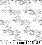 Clipart Of A Seamless Background Pattern Of Black And White Clouds In The Breeze Royalty Free Vector Illustration