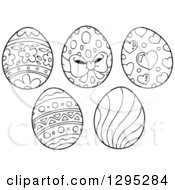 Lineart Clipart Of Black And White Patterned Easter Eggs Royalty Free Outline Vector Illustration