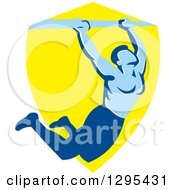 Poster, Art Print Of Retro Strong Male Bodybuilder Doing Pull Ups On A Bar Over A Yellow Shield