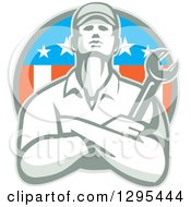 Clipart Of A Retro Male Mechanic Holding A Wrench With Folded Arms In An American Circle Royalty Free Vector Illustration