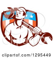 Clipart Of A Retro Male Mechanic Holding A Wrench Over His Shoulder In An American Shield Royalty Free Vector Illustration