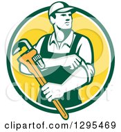 Poster, Art Print Of Retro Male Plumber Holding A Monkey Wrench And Rolling Up His Sleeves In A Green White And Yellow Circle