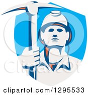 Retro Male Coal Miner Holding A Pickaxe In A Blue Shield