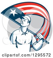 Retro Male Handyman Walking With An American Themed Flag Over His Shoulder In A Gray Circle