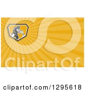 Clipart Of A Retro Sandblaster And Yellow Rays Background Or Business Card Design Royalty Free Illustration