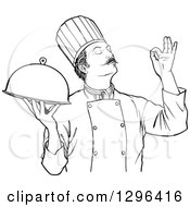 Clipart Of A Black And White Male Chef Holding A Cloche Platter And Gesturing Ok Royalty Free Vector Illustration