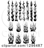 Clipart Of Black And White Tibal Fire Tattoo Design Elements Royalty Free Vector Illustration