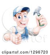 Poster, Art Print Of Happy Middle Aged Brunette Caucasian Worker Man Wearing A Baseball Cap Holding A Hammer And Thumb Up