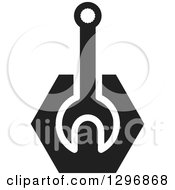 Clipart Of A Black And White Wrench In A Hexagon Royalty Free Vector Illustration
