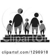 Black Silhouetted Family Of Five Holding Hands On Steps
