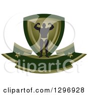 Poster, Art Print Of Silhouetted Flexing Male Bodybuilder With A Green And Gold Shield And Blank Banner