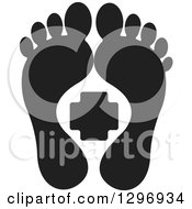 Black Silhouetted Feet And A First Aid Medical Cross