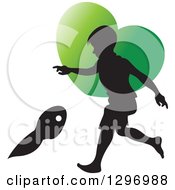 Poster, Art Print Of Black Silhouetted Boy Playing Over A Green Heart