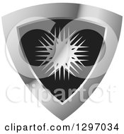 Clipart Of A Grayscale Snowflake Design In A Silver And Black Shield Royalty Free Vector Illustration by Lal Perera