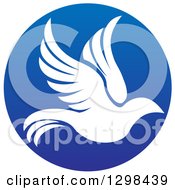 Clipart Of A Silhouetted White Dove In Flight Inside A Blue Circle Royalty Free Vector Illustration by AtStockIllustration