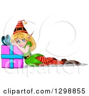 Poster, Art Print Of Blue Eyed Blond White Female Christmas Elf Resting And Leaning On A Present