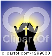 Poster, Art Print Of Silhouetted Hands Holding A Cross With Glowing Light On Purple