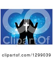 Clipart Of Silhouetted Hands Holding A Cross With Glowing Blue Lights Royalty Free Vector Illustration by ColorMagic