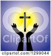 Poster, Art Print Of Silhouetted Hands Under A Floating Glowing Cross Over Purple