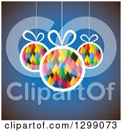 Clipart Of Pyramid Patterned Baubles Suspended Over Blue Royalty Free Vector Illustration by ColorMagic