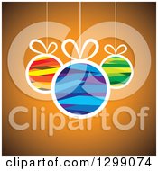 Clipart Of Ribbon Patterned Baubles Suspended Over Orange Royalty Free Vector Illustration by ColorMagic