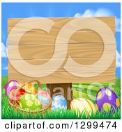 Poster, Art Print Of Blank Wood Easter Sign With Eggs In Grass Against A Sky