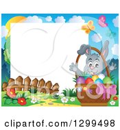 Poster, Art Print Of Gray Bunny Rabbit Behind A Basket Of Easter Eggs In A Park With White Text Space