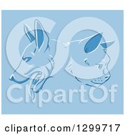 Poster, Art Print Of Cat And Dog Faces In Profile Over Blue