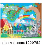 Poster, Art Print Of Gray Bunny Rabbit Resting In A Park With A Spring Rainbow And Butterflies