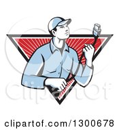 Retro Male Worker Holding A Hdmi Cable And Emerging From A Black White And Red Rays Triangle