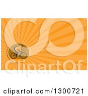 Poster, Art Print Of Retro Silhouetted Cyclist In Profile And Orange Rays Background Or Business Card Design