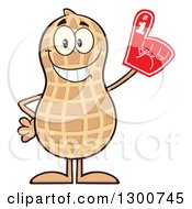Happy Peanut Mascot Character Wearing A Foam Finger
