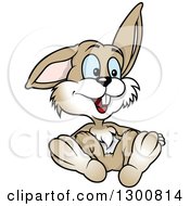 Clipart Of A Cartoon White And Tan Bunny Rabbit Sitting Royalty Free Vector Illustration