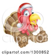Clipart Of A Christmas Turkey Bird Wearing A Santa Hat And Giving A Thumb Up Royalty Free Vector Illustration