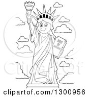 Carton Black And White Happy Statue Of Liberty Holding Up A Torch