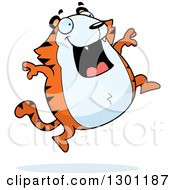 Clipart Of A Cartoon Happy Chubby Tiger Jumping Royalty Free Vector Illustration