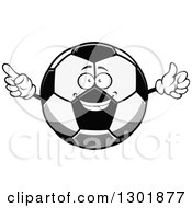 Clipart Of A Cartoon Grayscale Happy Soccer Ball Character Pointing And Giving A Thumb Up Royalty Free Vector Illustration