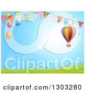 Colorful Hot Air Balloon Over A Spring Landscape With A Bunting Banner And Party Balloons