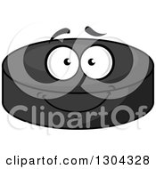 Clipart Of A Hockey Puck Character Smiling Royalty Free Vector Illustration