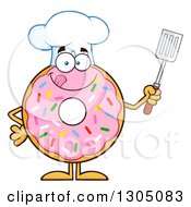 Cartoon Happy Round Pink Sprinkled Donut Chef Character Holding A Spatula