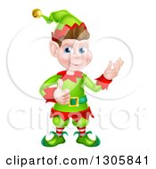 Clipart Of A Young Brunette White Male Christmas Elf Presenting And Giving A Thumb Up Royalty Free Vector Illustration by AtStockIllustration